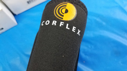 Black corflex cooltex knee sleeve with yellow logo and white lettering designed for reuse medical equipment support