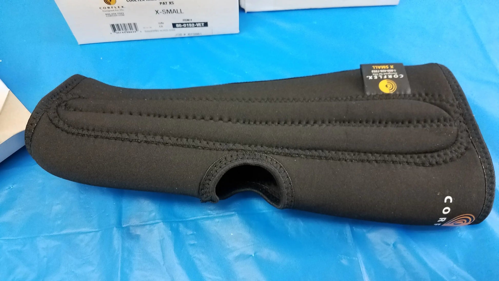 Black neoprene coriolis x-small wrist support with reinforced stitching and branded label for reuse medical equipment use