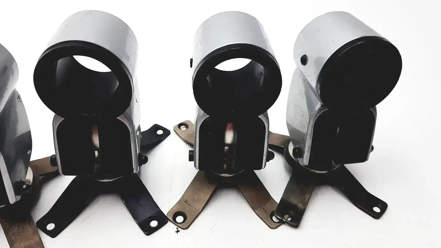 Three silver metal clamps with black interiors and mounting brackets from hospital surplus equipment clamps lot of 5