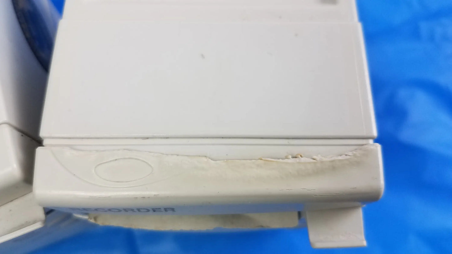 White plastic philips m1116b recorder module with visible wear and reorder label for medical equipment use