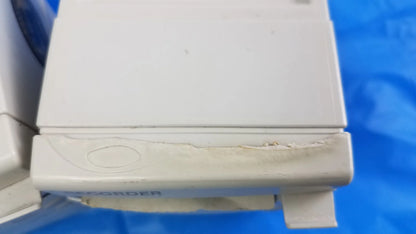 White plastic philips m1116b recorder module with visible wear and reorder label for medical equipment use