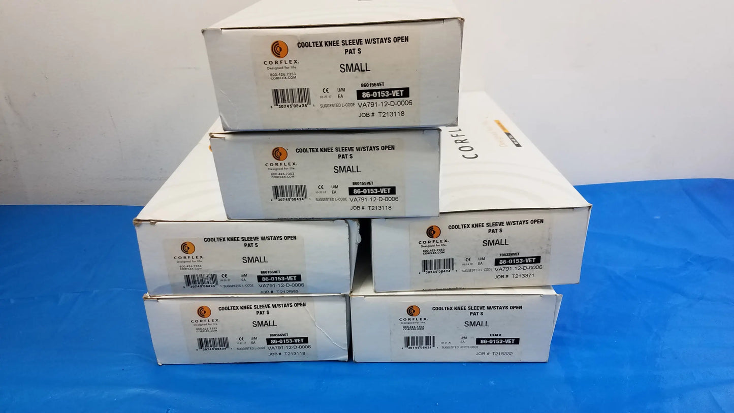 White cardboard boxes of corflex cooltex knee sleeves with stays open in small size medical equipment lot of 6