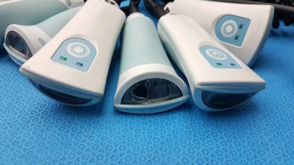 Lot of 7 welch allyn handheld barcode scanners in white and light blue with circular logos on the front