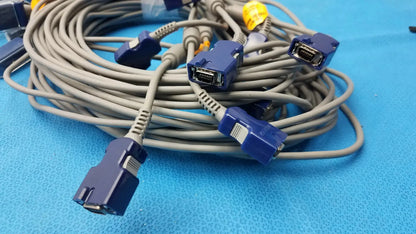 Lot of 8 coiled gray nellcor doc-10 spo2 adapter extension cables with blue plastic connectors for medical monitoring
