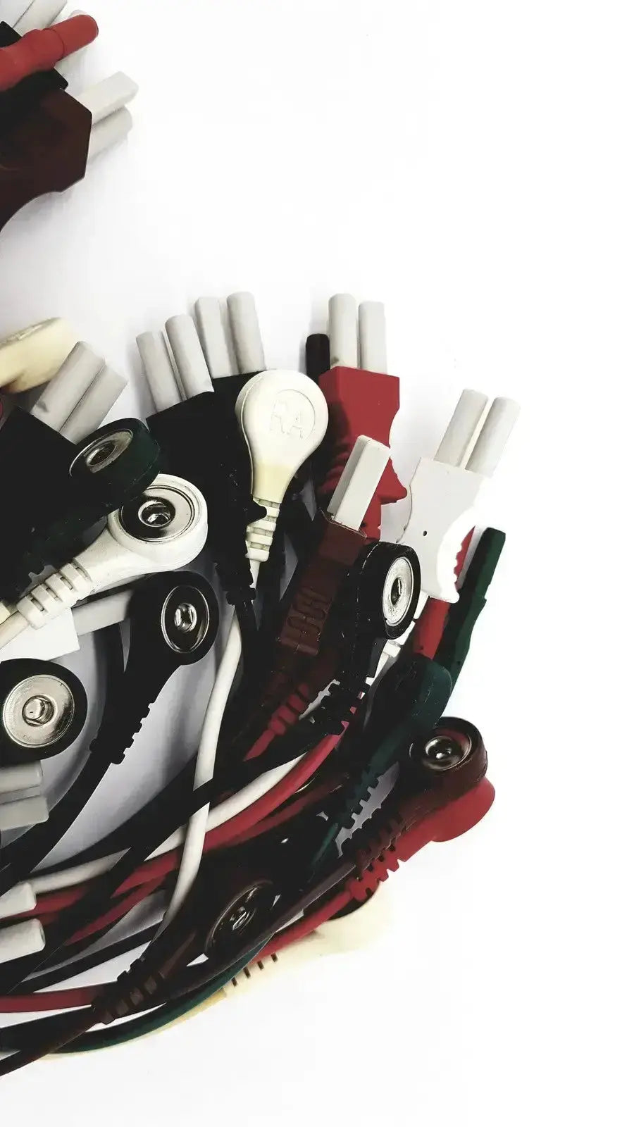 A bundle of mix mindray compatible ecg leadwires in black red white and green with plastic connectors for medical use