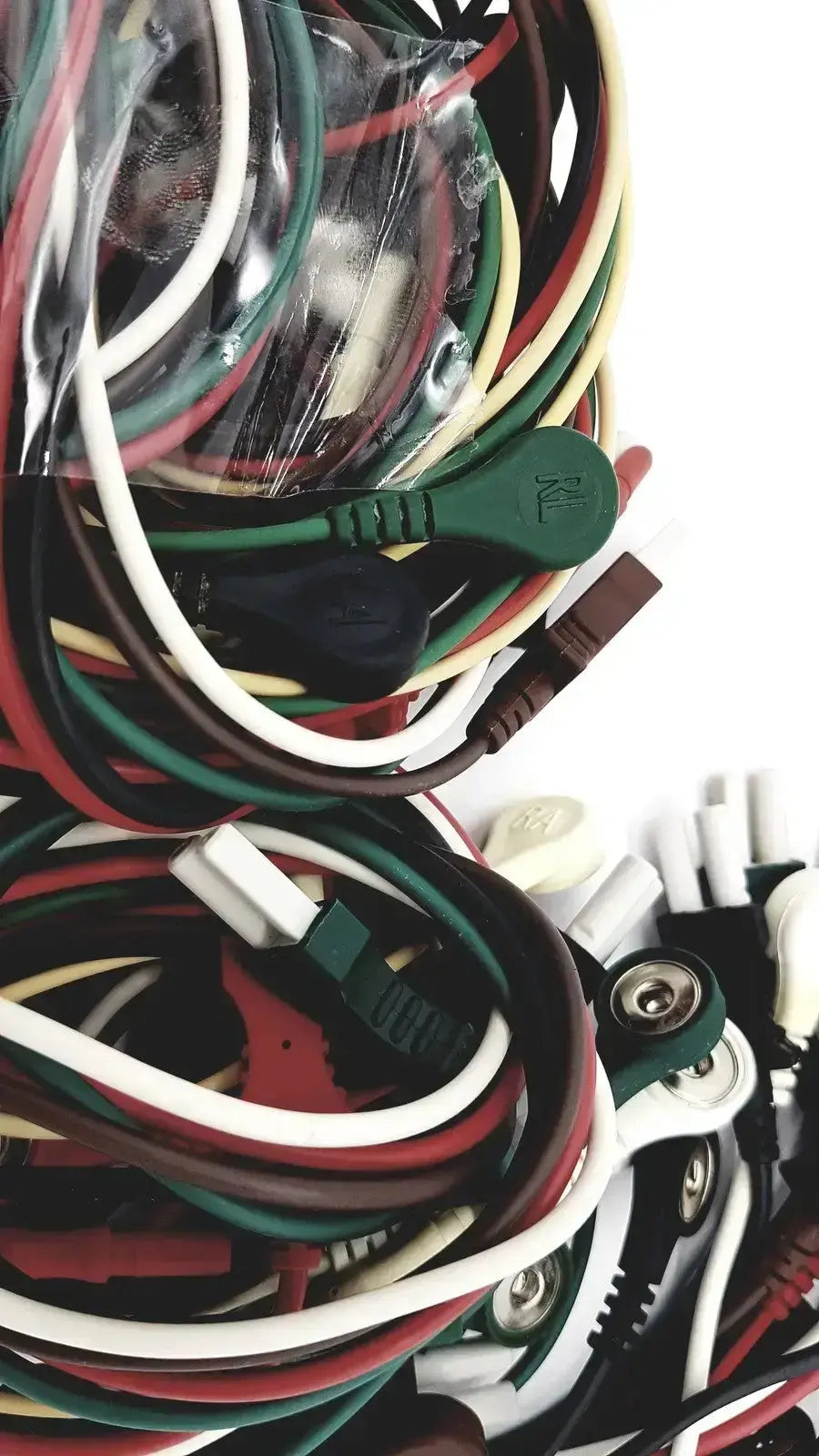 A bundle of multicolored mix mindray compatible ecg leadwire with plastic connectors and insulated cables for medical use
