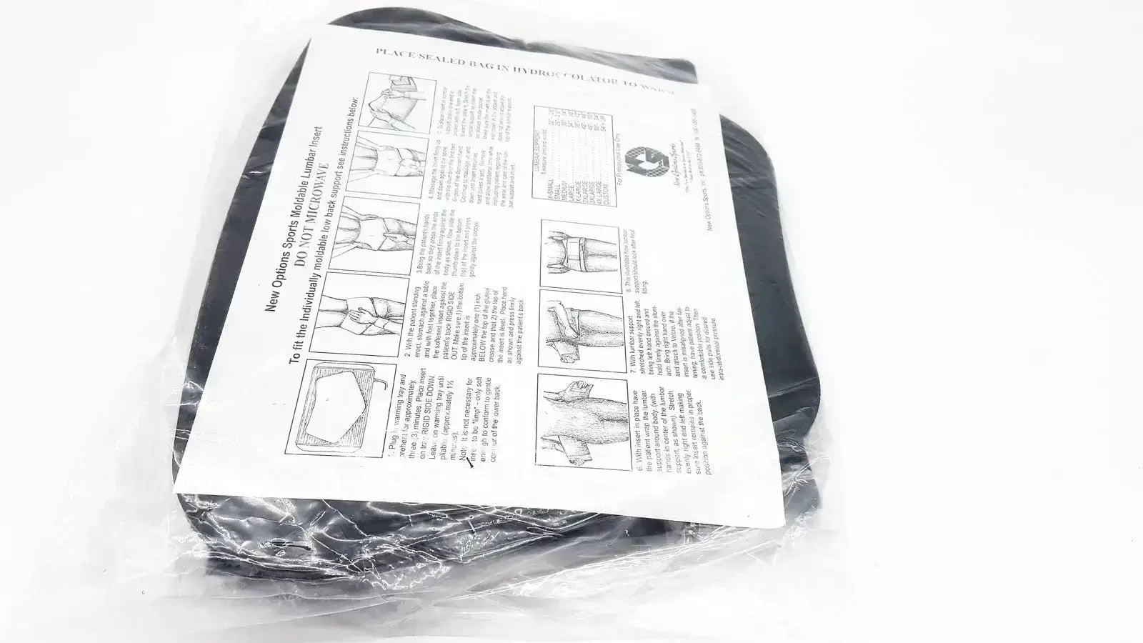 Black silicone breast form with instruction sheet in clear packaging for lumbar sacral orthosis with thermoplastic insert