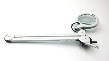 White adjustable magnifying lamp luxo lfg028214 with lfm led, 3 diopter lens, 45 inch arm, and clamp base untested