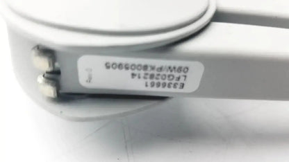White plastic luxo lfg028214 device with label showing model and serial numbers for lfm led with 3 diopter lens