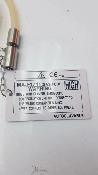 Silver metallic high-flow gas tube fit for olympus endoscopic co2 regulation unit with warning label and chain attachment