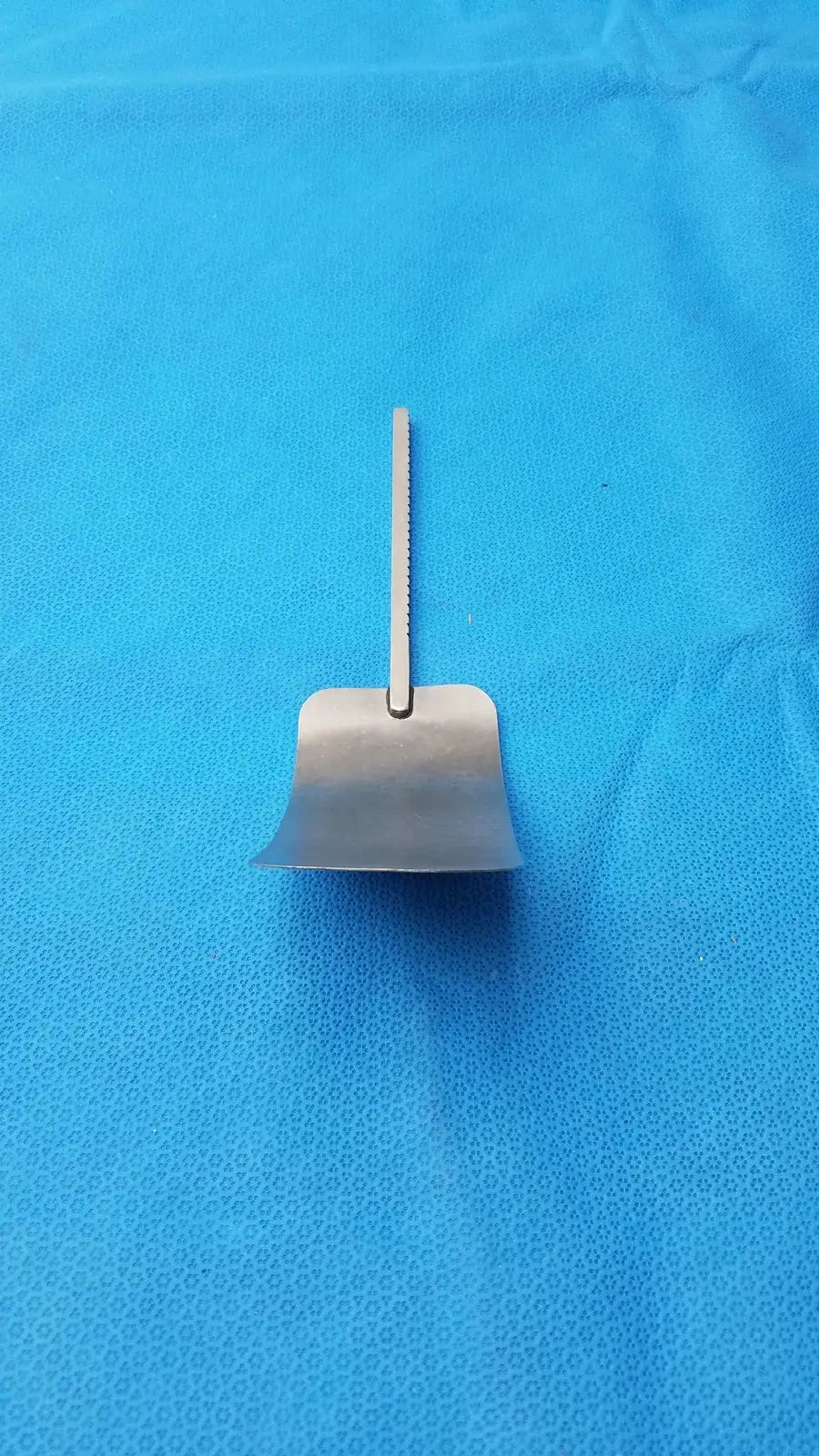 A sleek metallic malleable retractor blade stainless steel surgical instrument for reuse medical equipment use