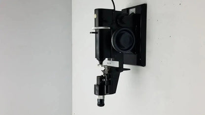 Black wall-mounted marco model 101 manual lensmeter with metallic accents and adjustable components for hospital surplus