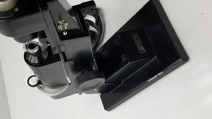 Black metal marco model 101 manual lensmeter with sturdy base and adjustable focus knobs from hospital surplus
