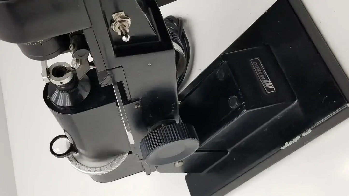 Black metal marco model 101 manual lensmeter with matte finish and adjustable components from hospital surplus