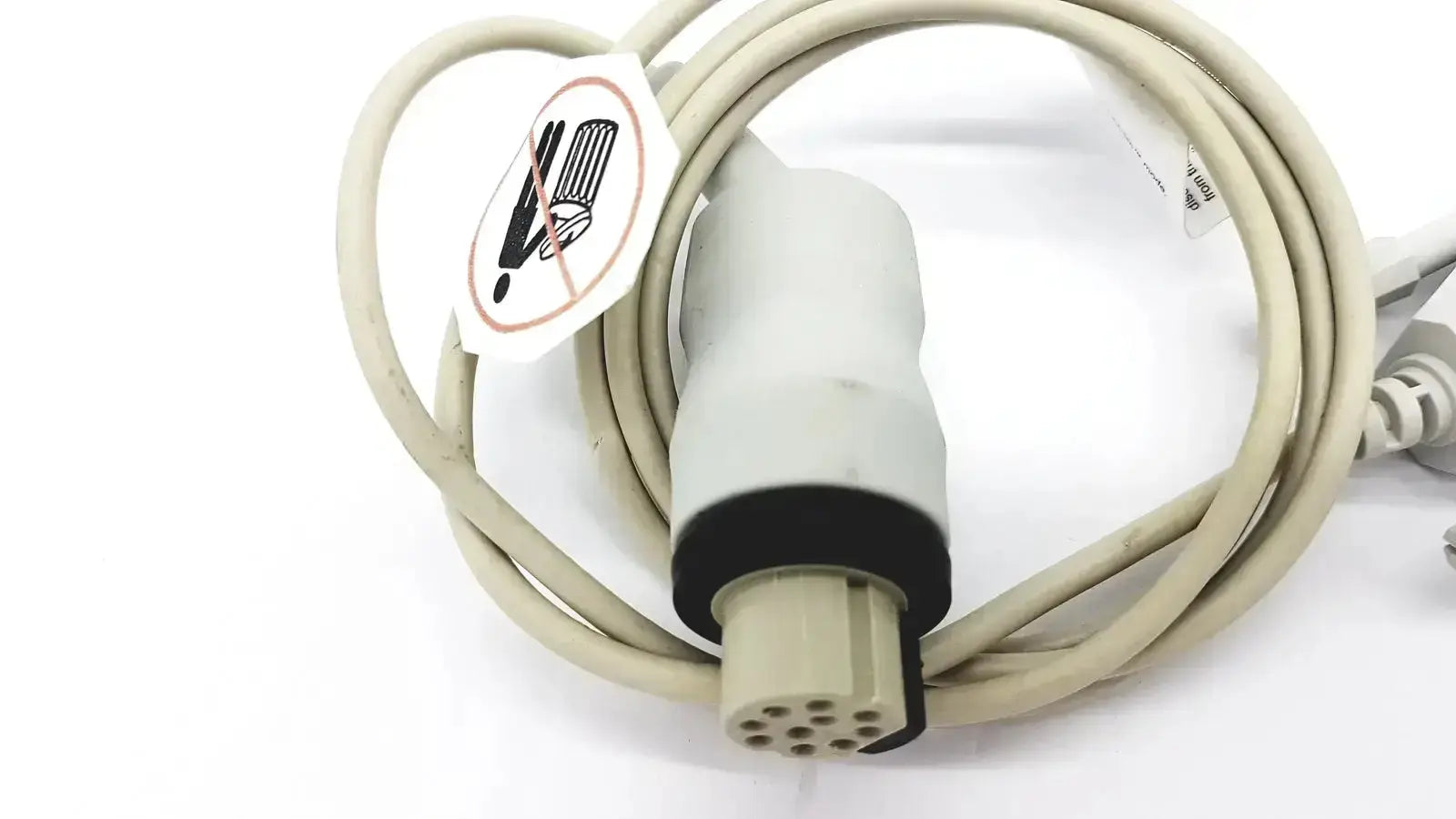 Beige masimo d006 satshare interface cable with gray connector, black rubber seal, and multiple pin ports for medical use