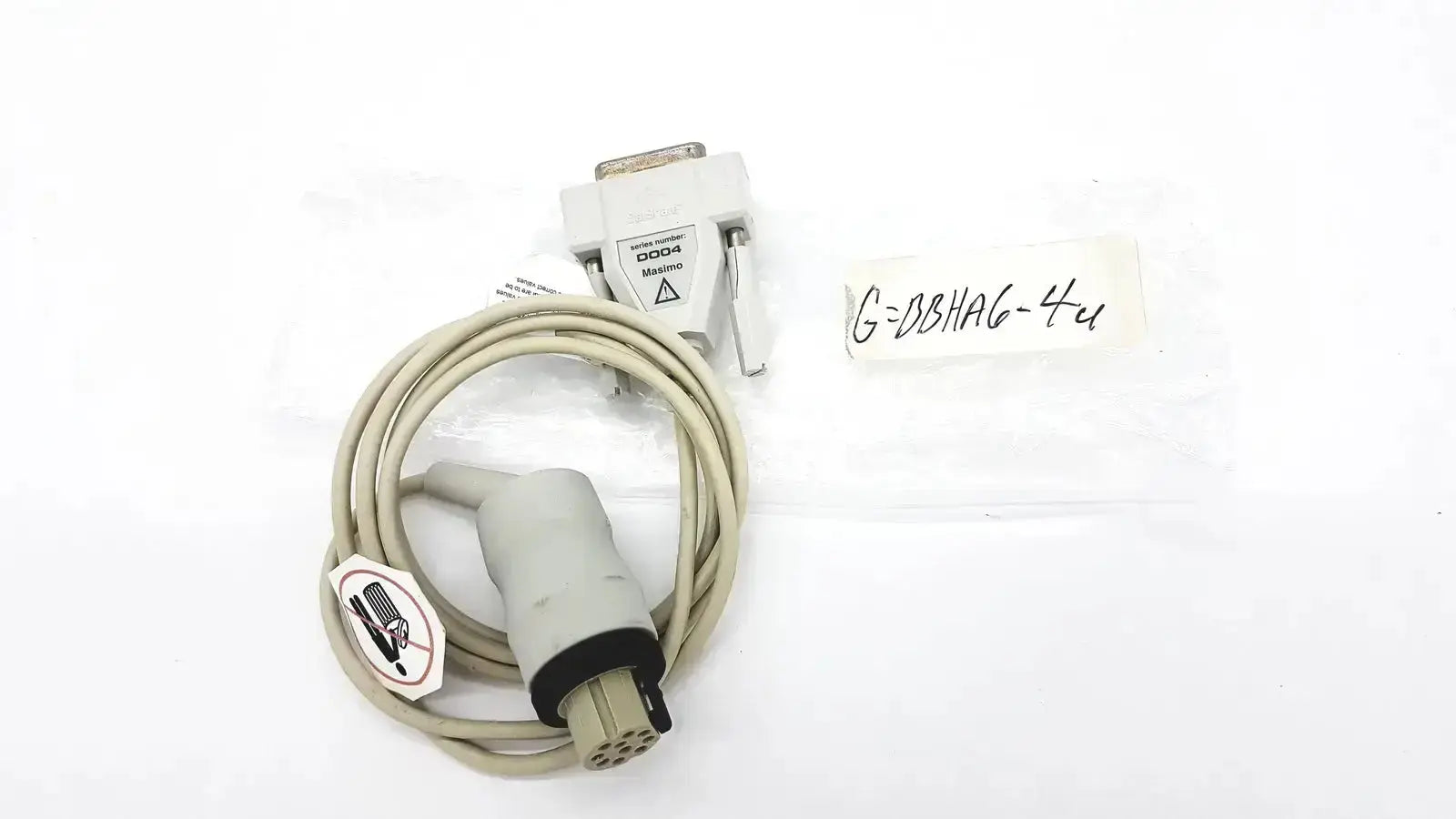 Beige masimo d006 satshare interface cable with d-sub connector and multi-pin plug labeled g=dsha6-4u
