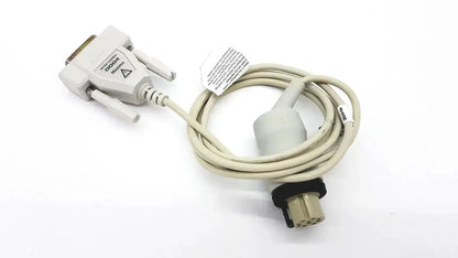 Beige masimo d006 satshare interface cable with white d-sub connector and black protective sleeve for secure connections