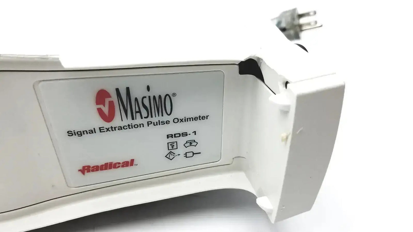 White plastic Masimo Set signal extraction pulse oximeter with red and black branding for accurate pulse monitoring