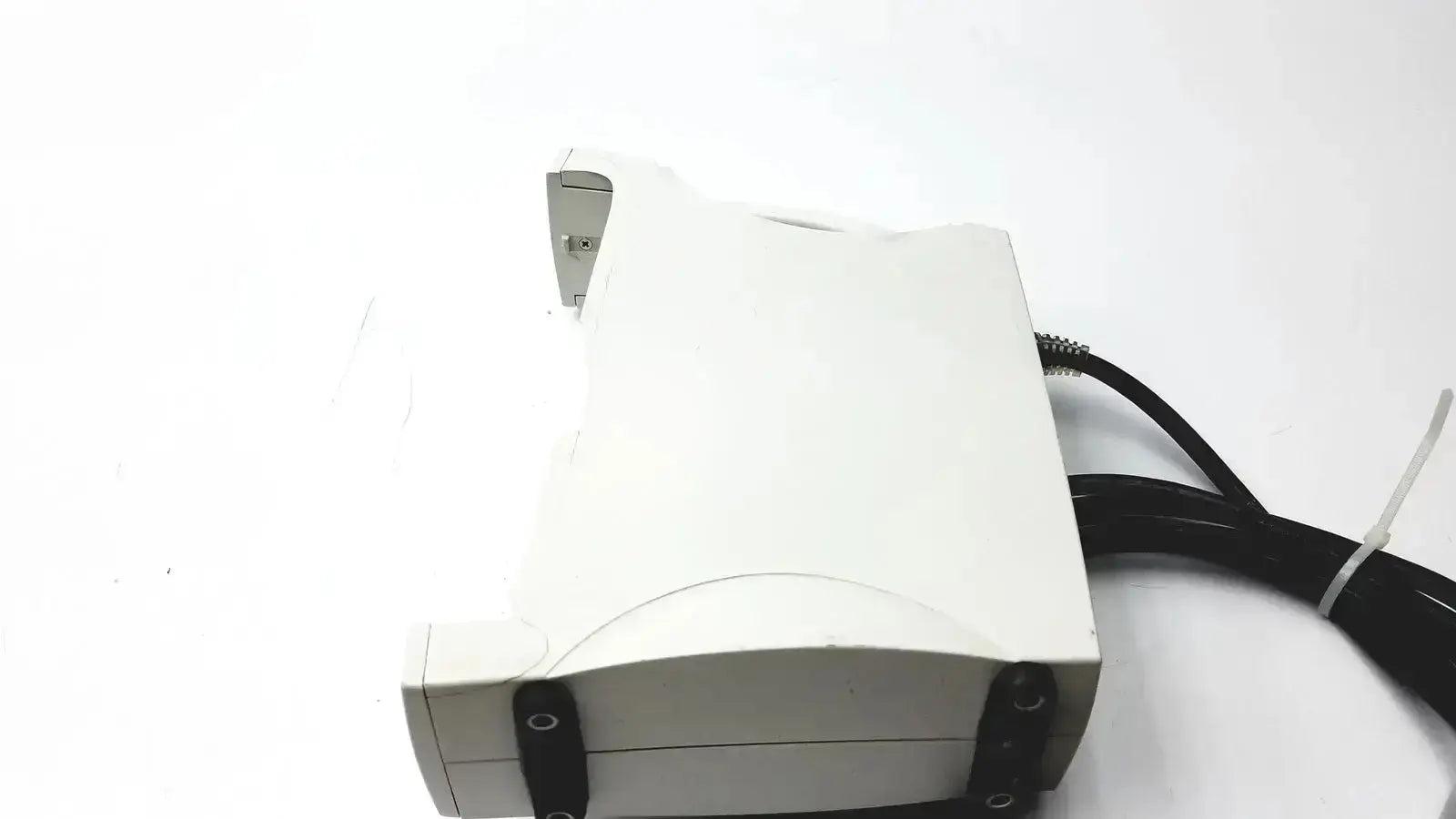 White plastic masimo set signal extraction pulse oximeter with silver metal bracket and black coiled cables