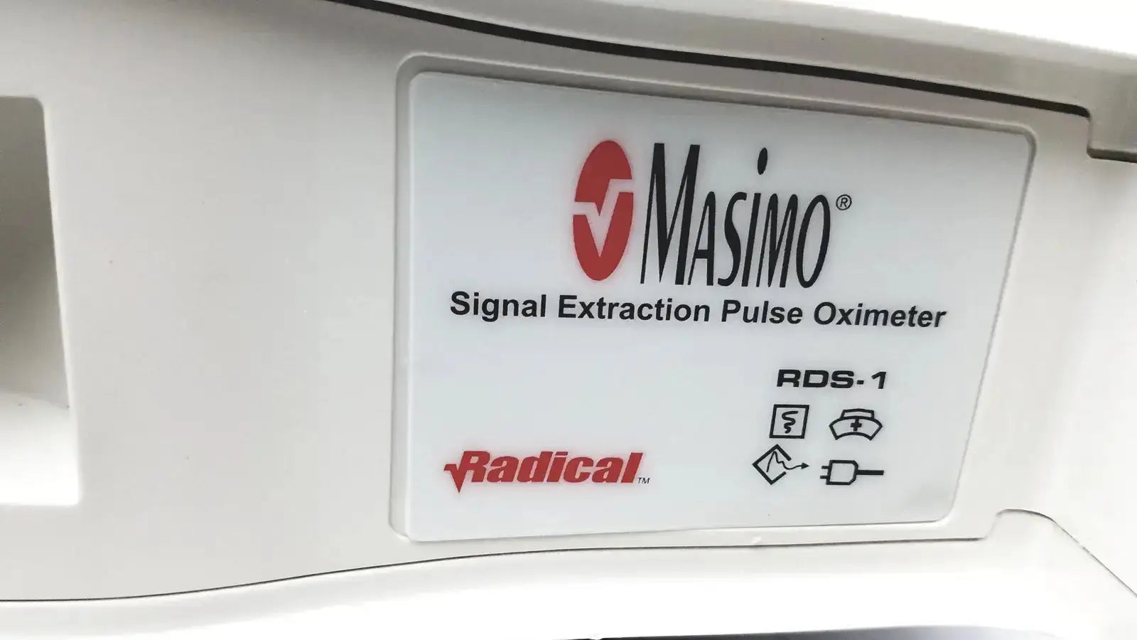 White Masimo signal extraction pulse oximeter RDS-1 with sleek plastic casing and red black branding for accurate readings