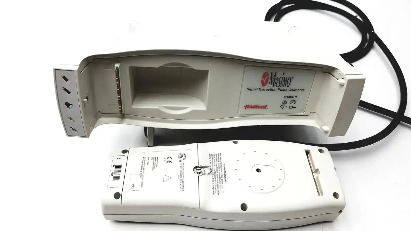White masimo signal extraction pulse oximeter with black cables and sleek ergonomic design for accurate readings