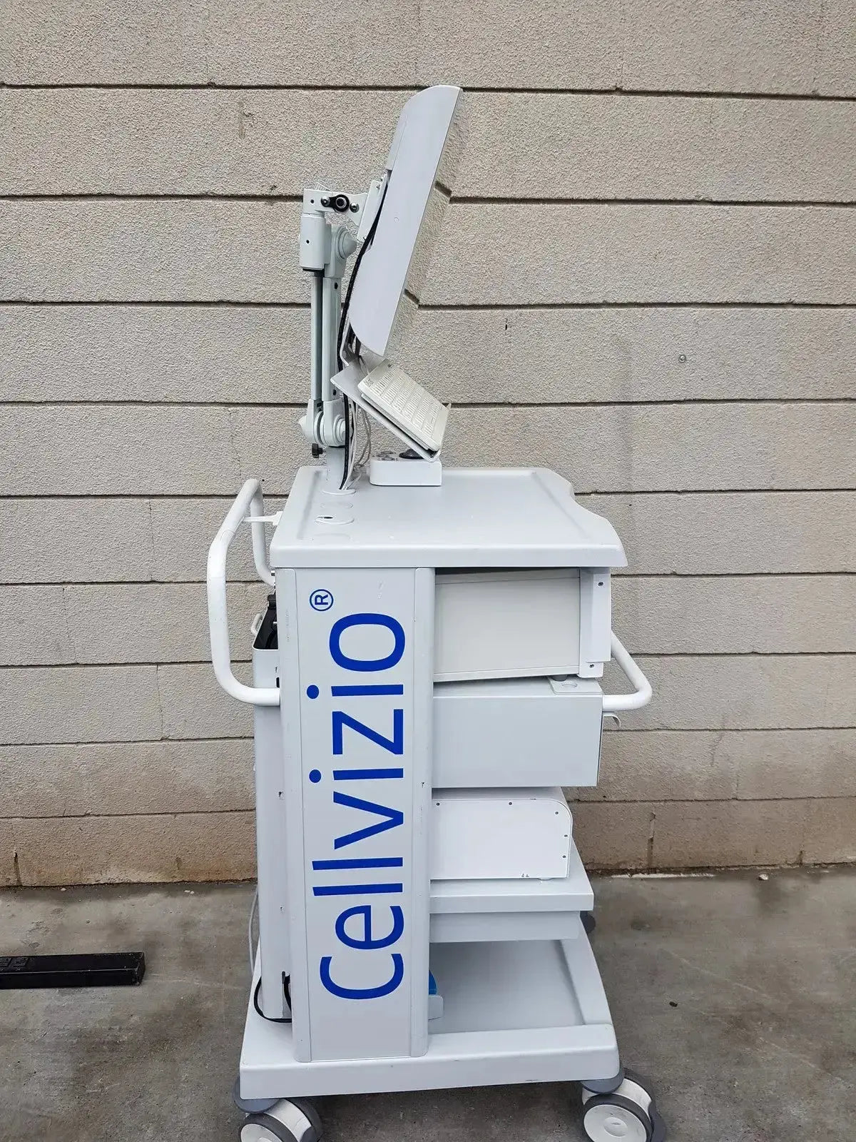White mobile medical imaging cart with blue cellvizio branding and adjustable monitor for mauna kea technologies f-400 v2 manometry system
