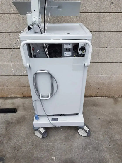 White medical cart with mounted monitor and coiled cables for mauna kea technologies cellvizio f-400 v2 manometry system
