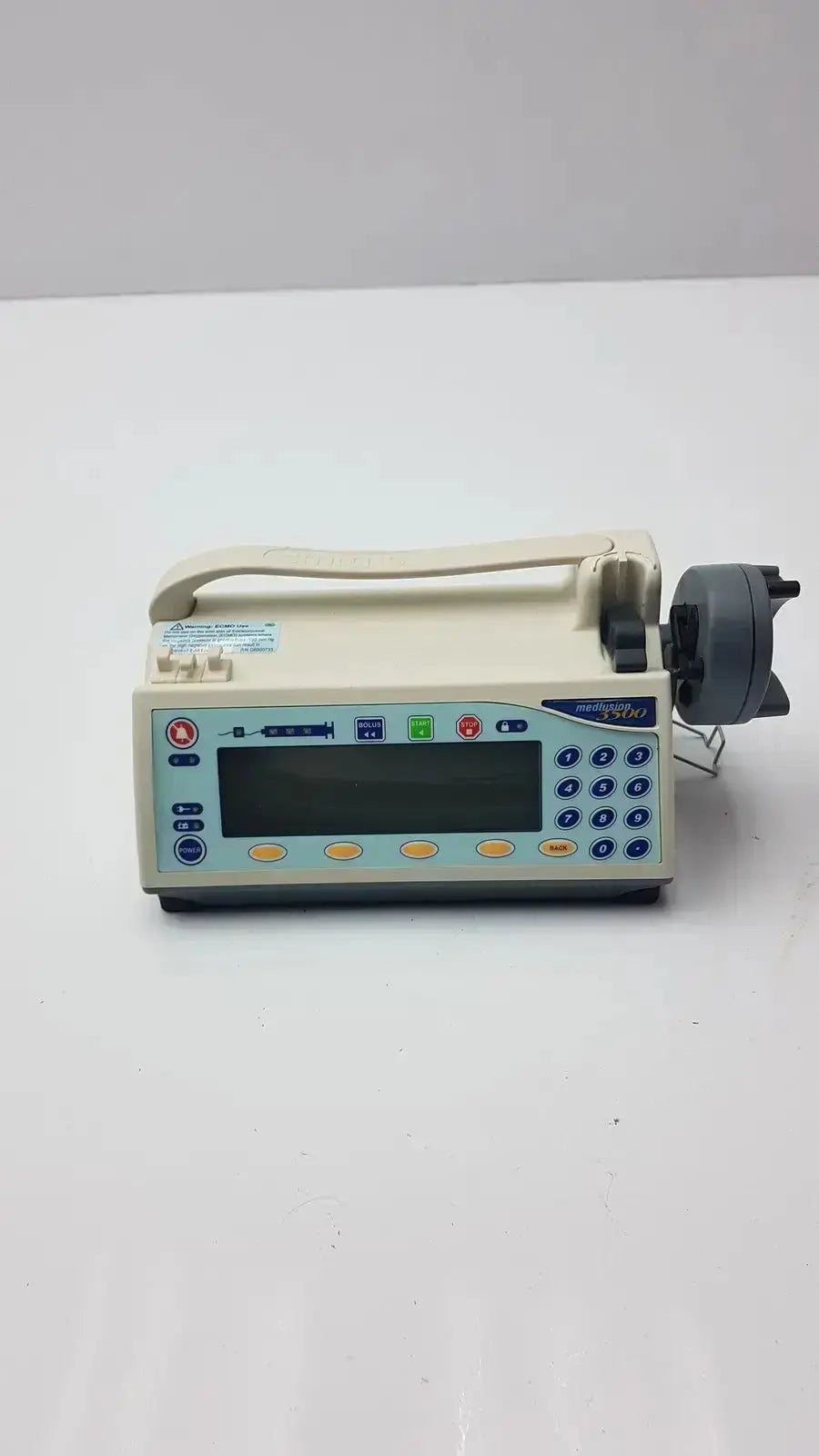 Beige medfusion 3500 infusion pump with pole clamp digital display blue gray buttons for hospital surplus biomedical evaluation