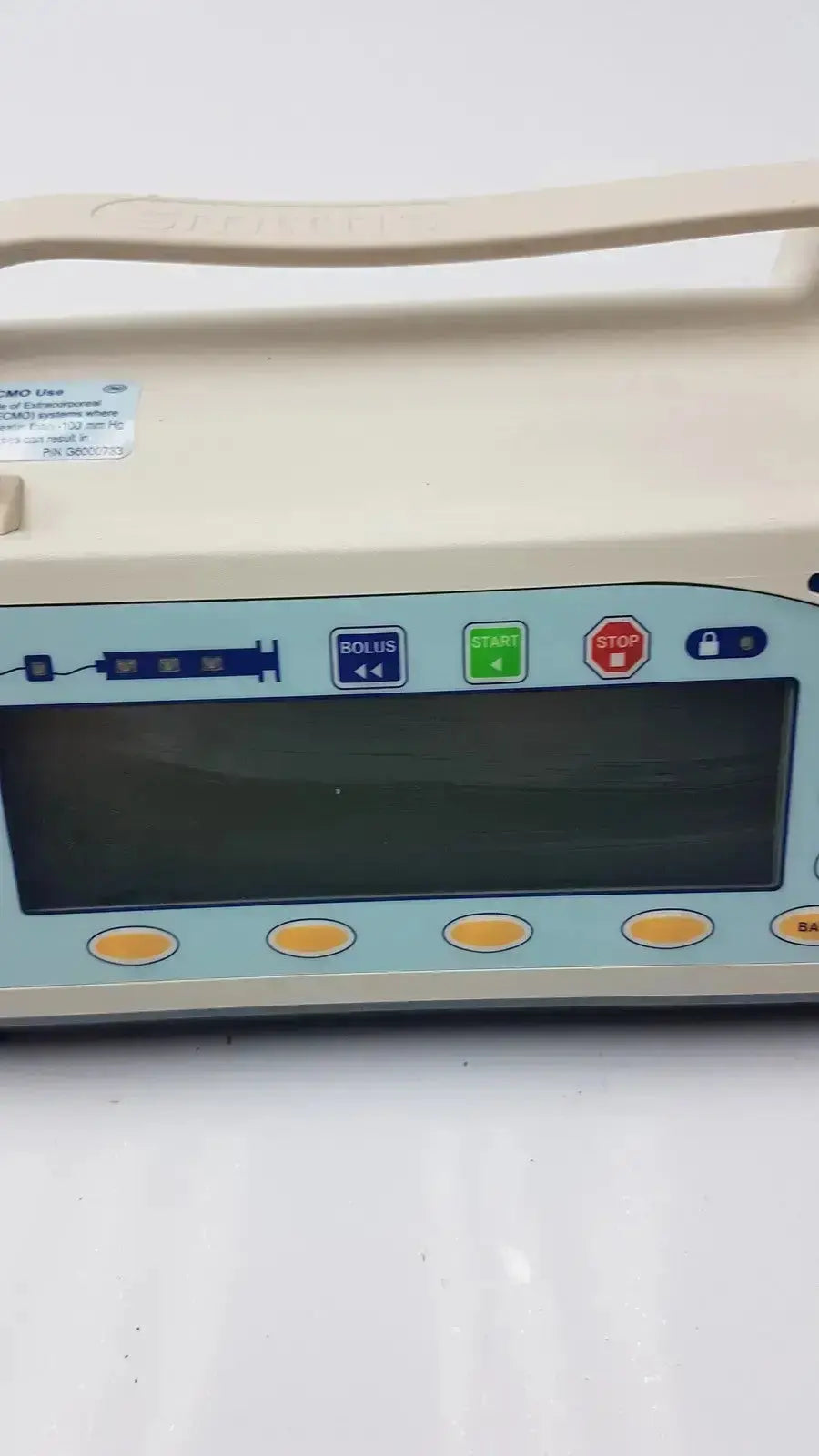 Beige medfusion 3500 medical infusion pump with pole clamp featuring light blue control panel for hospital surplus biomedical evaluation
