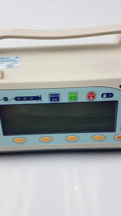 Beige medfusion 3500 medical infusion pump with pole clamp featuring light blue control panel for hospital surplus biomedical evaluation