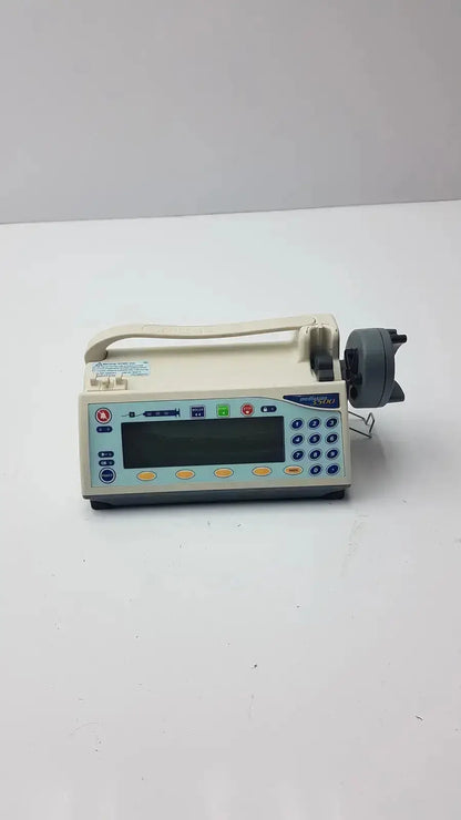Beige medfusion 3500 infusion pump with digital display keypad and pole clamp for hospital surplus biomedical evaluation