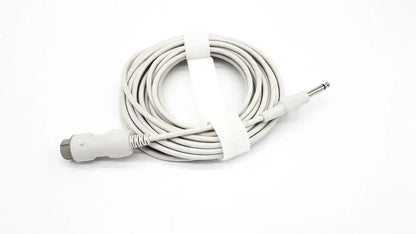 White coiled reusable bare copper wire ibp cable with gray connector and silver 6.35mm jack secured by white tie