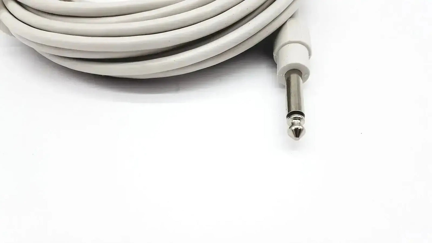 A coiled white ibp cable with reusable bare copper wire and a metallic 6.35mm jack for mindray medical use