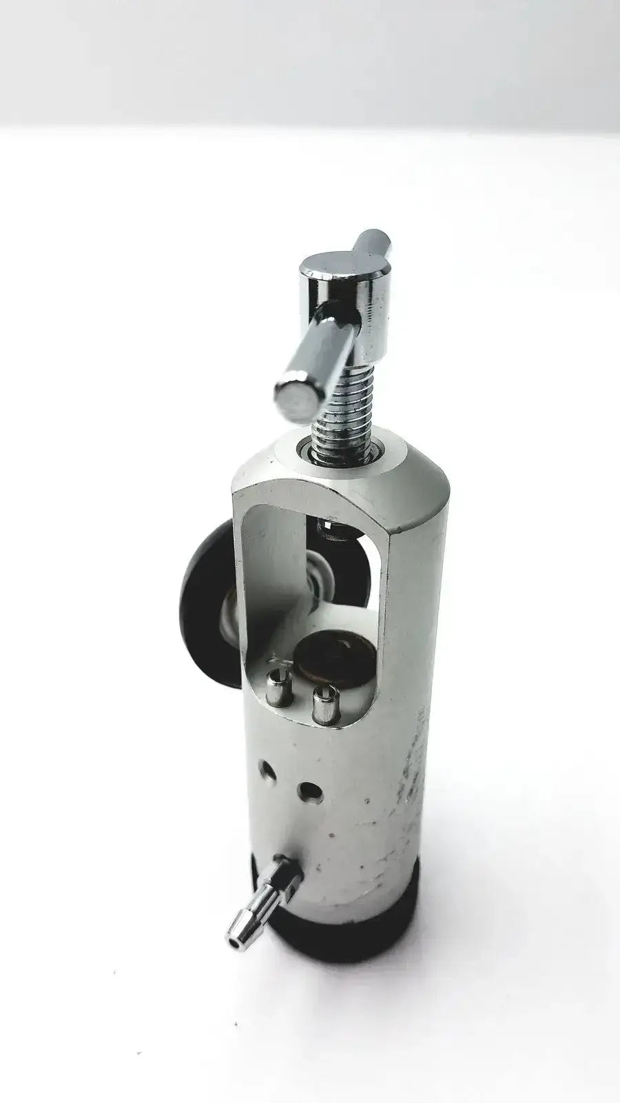 Chrome-finished medline brass-sleeved 50 psi o2 regulator with black rubber seals and threaded adjustment knob for hospital surplus
