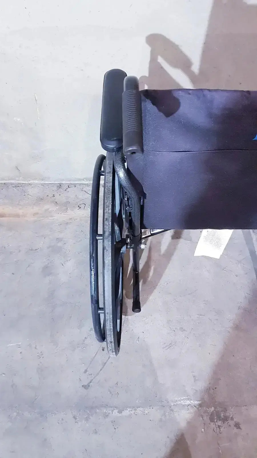 Black medline guardian k1 lightweight wheelchair compact seat with padded seat and textured armrests ready to use