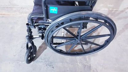 Black guardian k1 lightweight wheelchair compact seat rear view with large wheels and teal logo on backrest