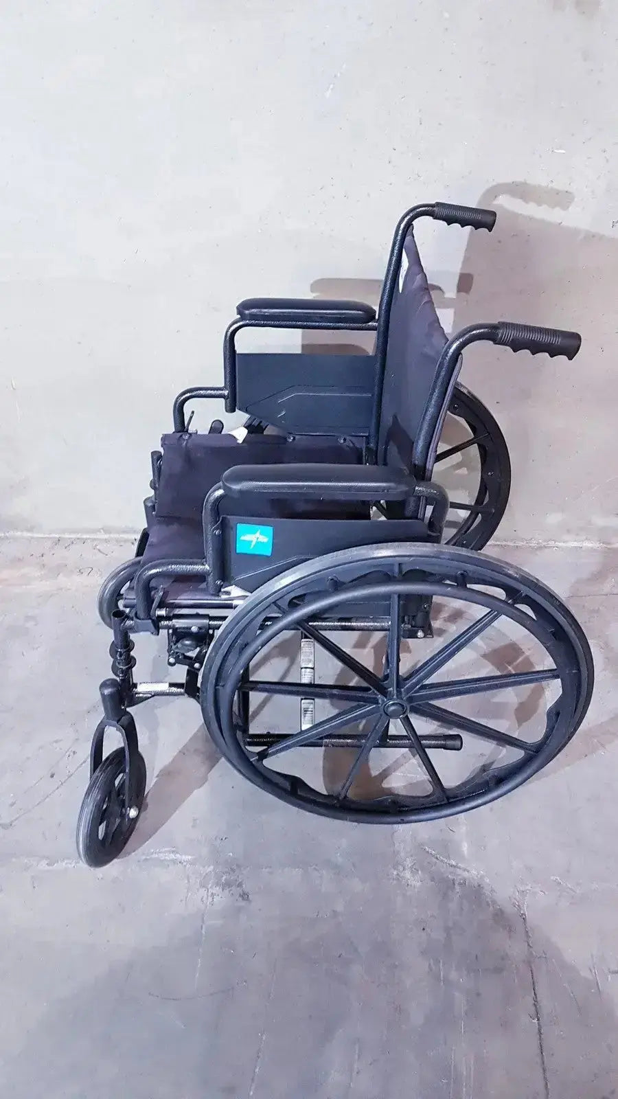Black metal guardian k1 lightweight wheelchair compact seat with dark fabric backrest ready to use