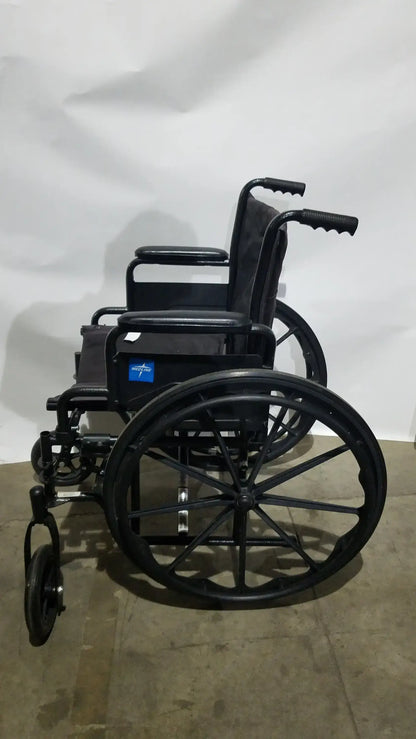 Medline Guardian Standard Manual Wheelchair with Padded Arms and Durable Folding Frame