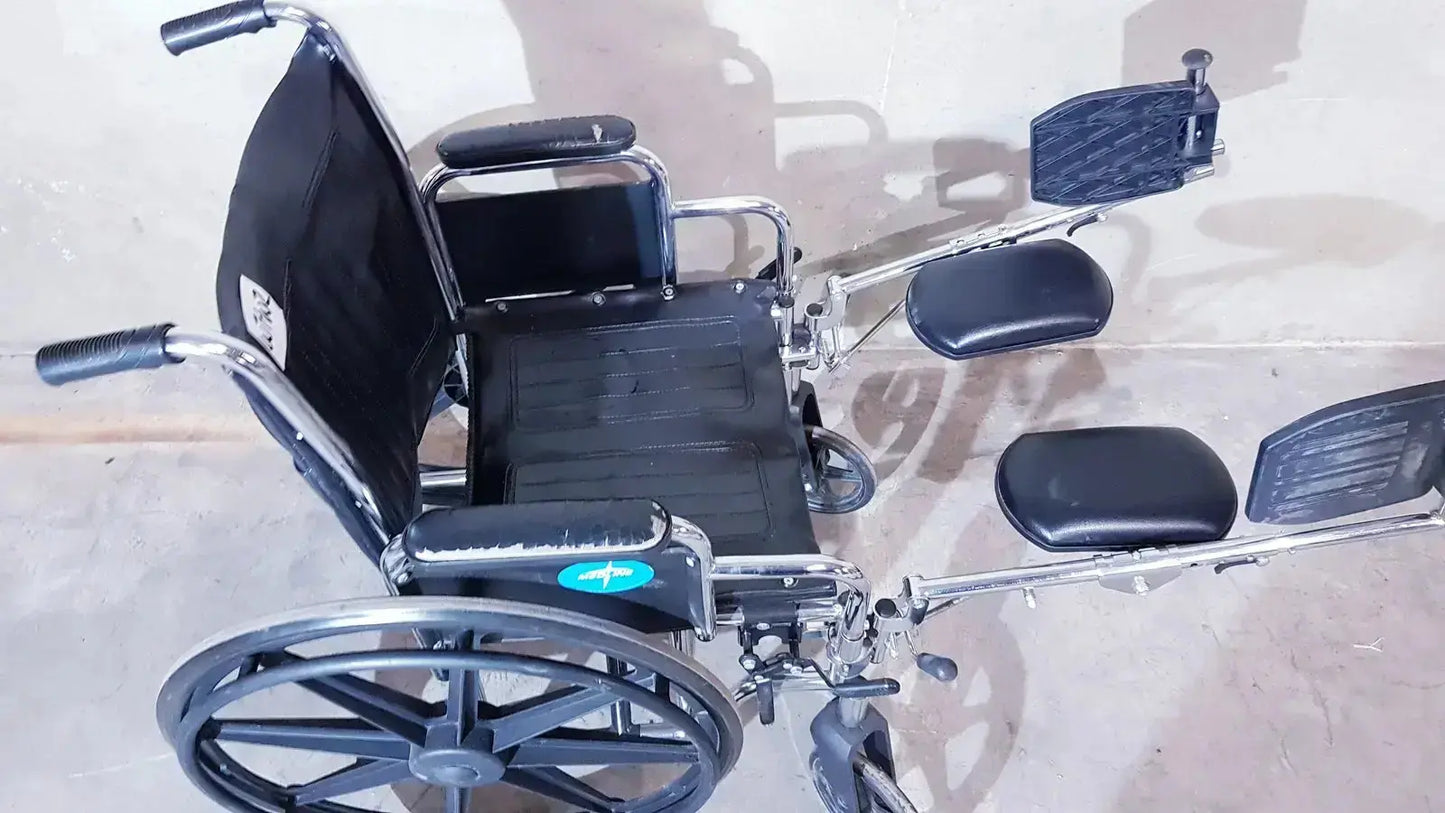 Black upholstered medline k1206n22e manual wheelchair with chrome frame and large rear wheels for adults
