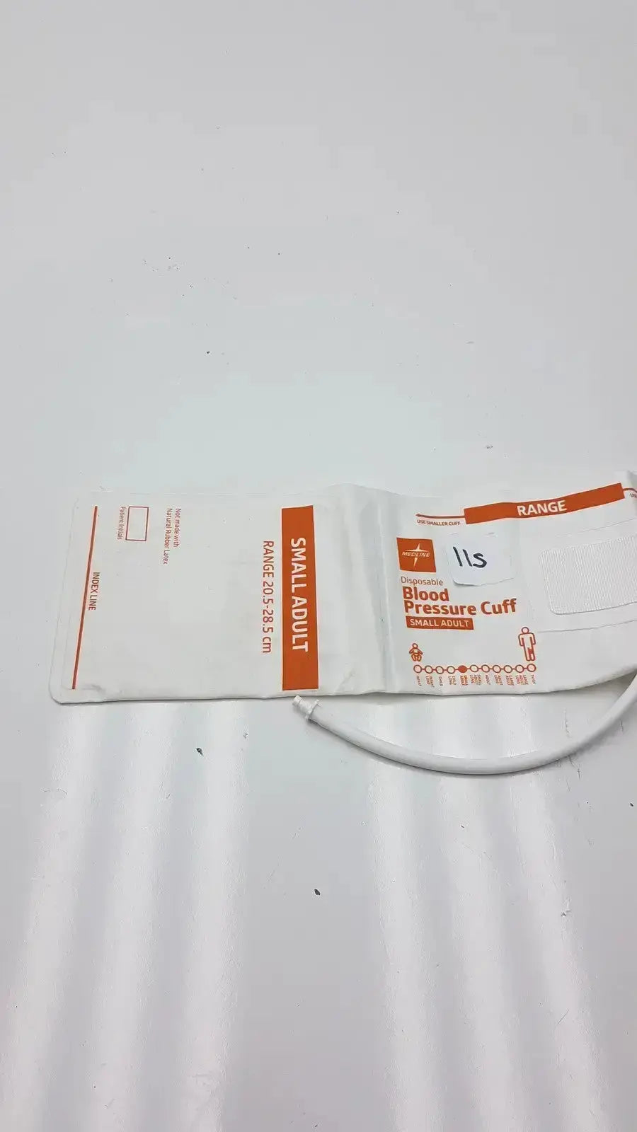 Medline small adult disposable white and orange blood pressure cuff in sterile wrapper for adult blood pressure use