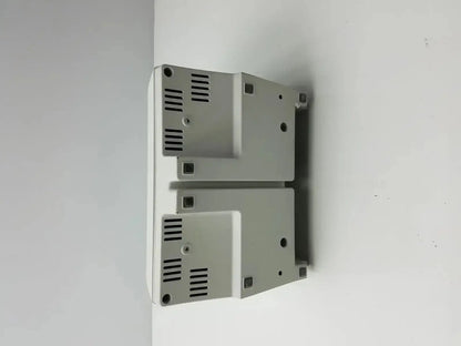 Two stacked light gray metallic industrial control panels with vented sides for medrad stellant ct power supply