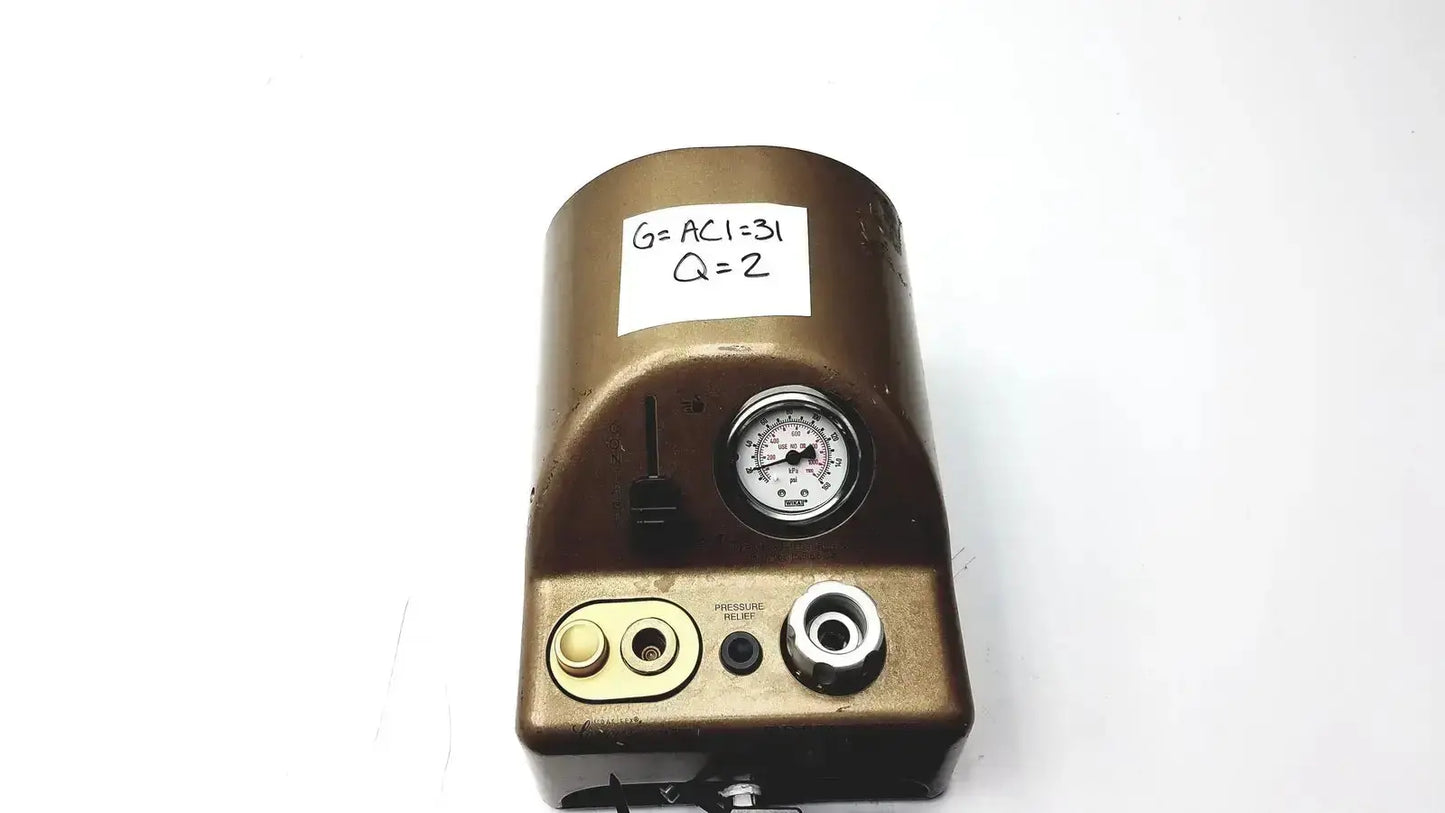Bronze-colored industrial pressure regulator with circular gauge and multiple ports for midas rex legend gold pneumatic use