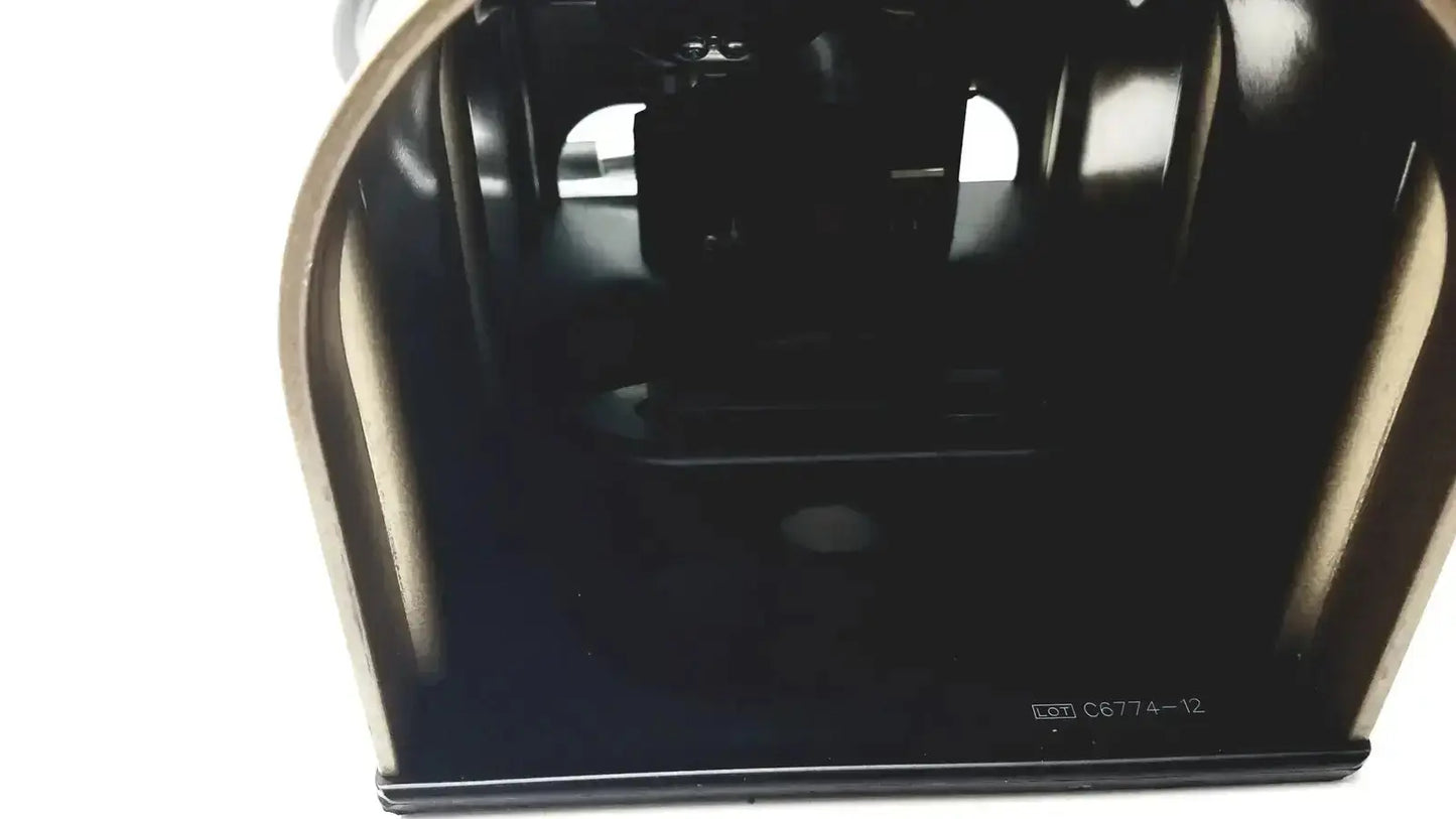 Black plastic tissue box with gold-colored trim featured with midas rex legend gold pneumatic design details