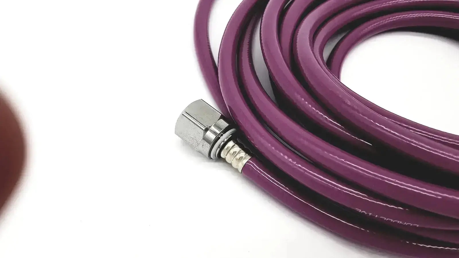 Mercury medical conductive vacuum hose assembly with purple coiled hose and metallic threaded connector for medical use