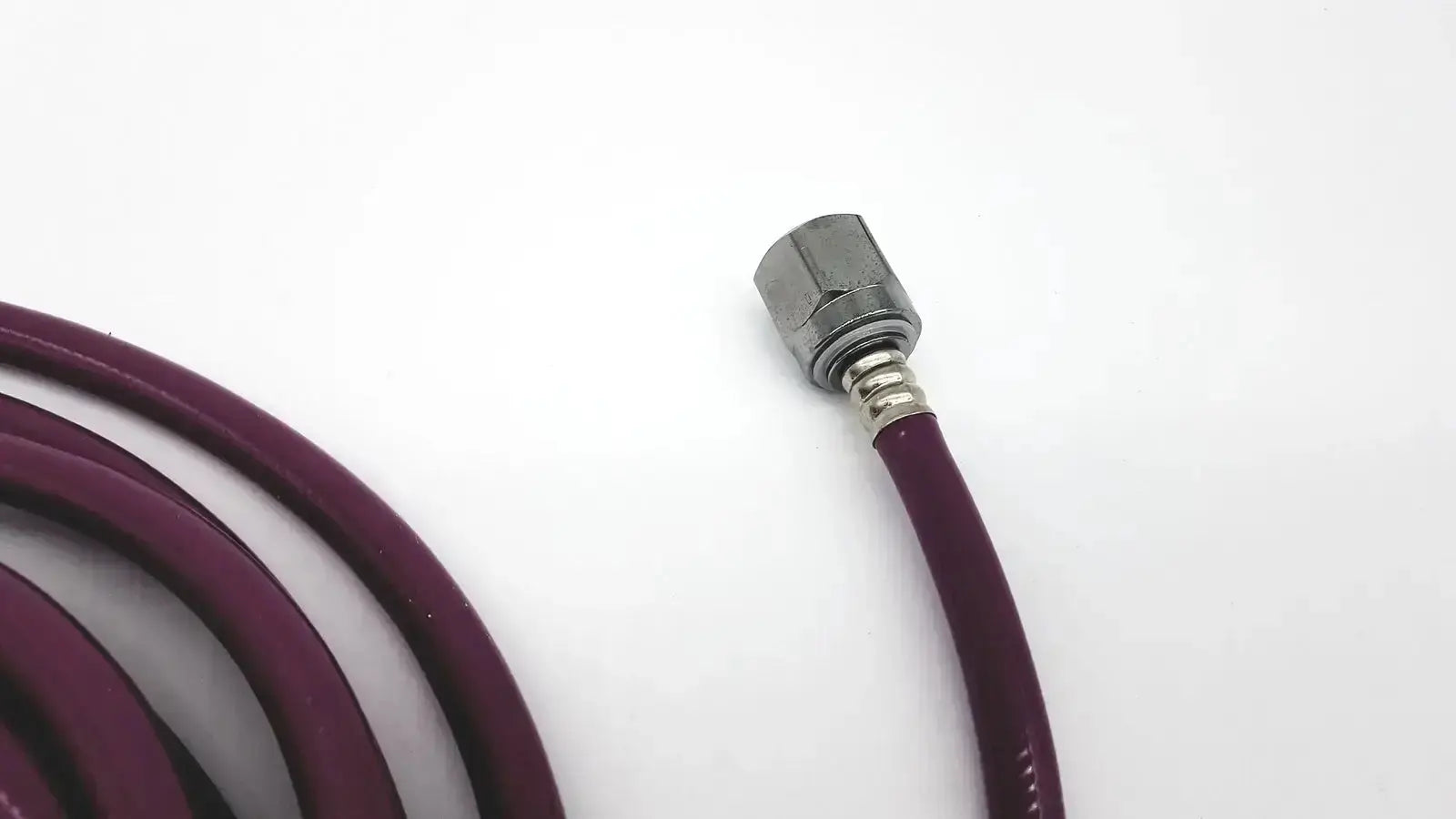Mercury medical conductive vacuum hose assembly featuring maroon rubber hose with metallic hexagonal connector