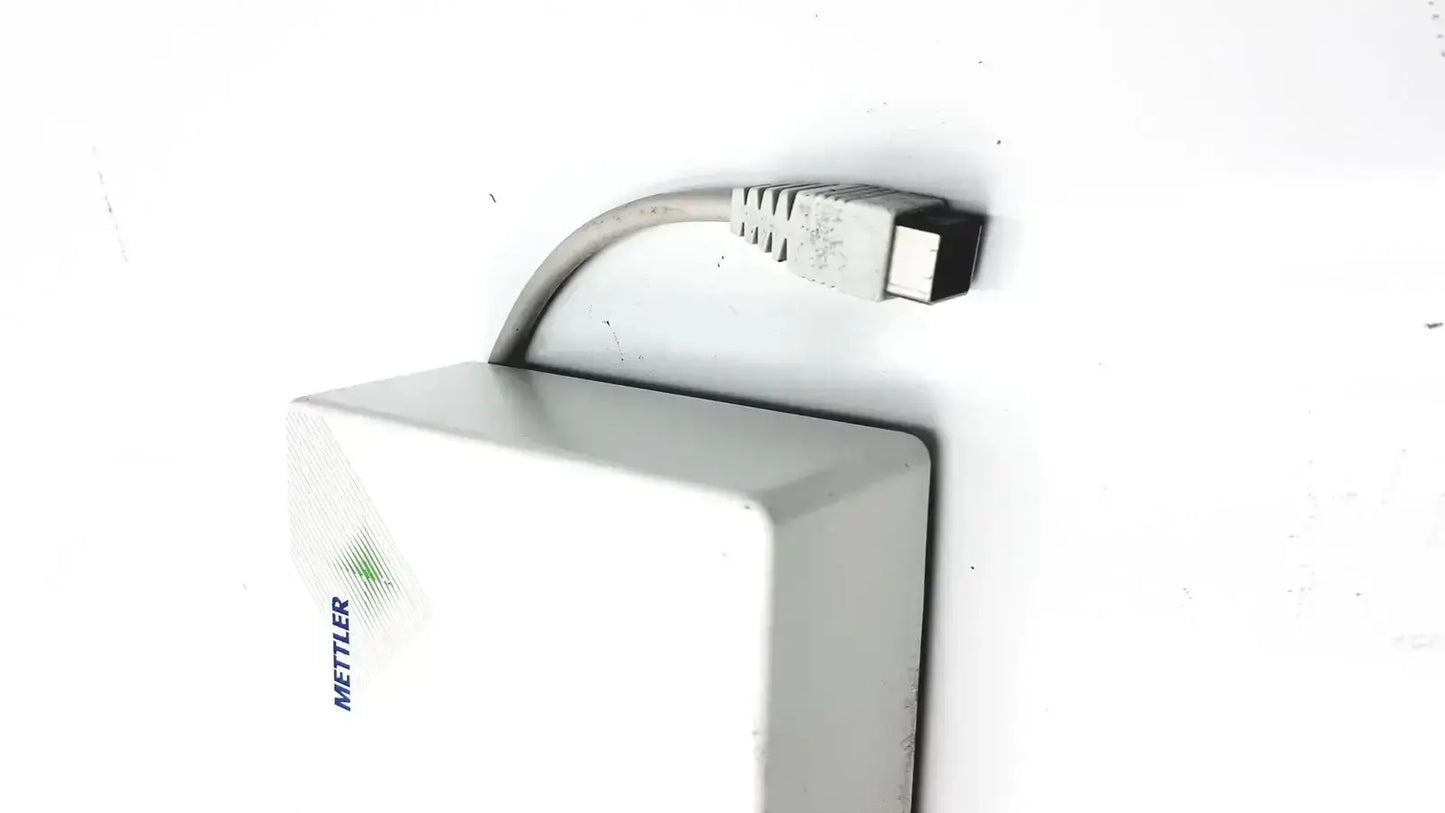 White rectangular mettler toledo power supply with gray cable and black connector for digital balance scale use