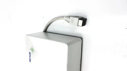 White rectangular mettler toledo power supply with gray cable and black connector for digital balance scale use