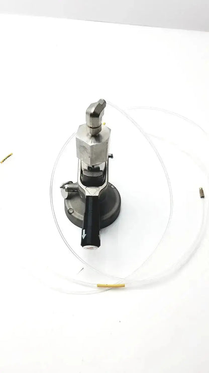 Silver and black industrial air compressor with transparent tubing for micro matic inlet keg coupler 12 psi pressure