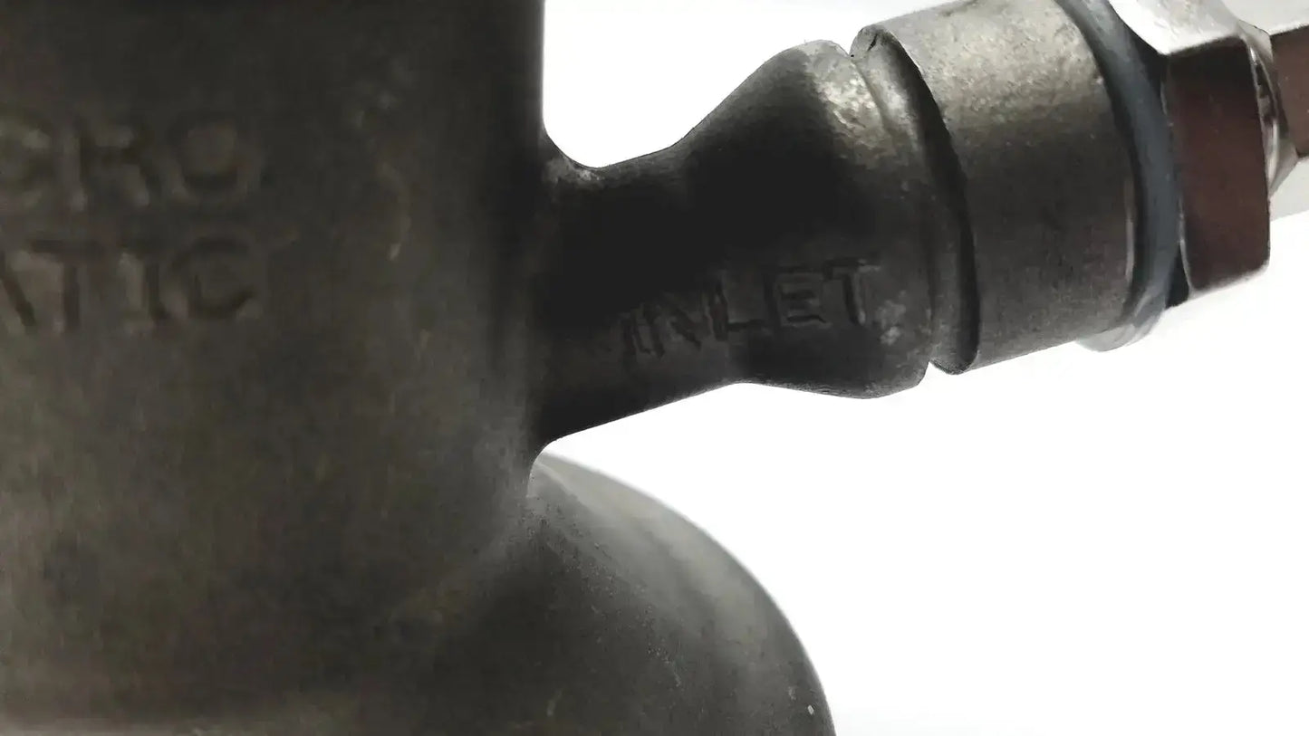 Dark gray metallic micro matic inlet keg coupler pipe fitting with embossed prostatic and arlet text for 12 psi use