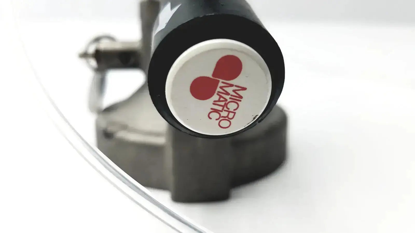 Black cylindrical micro matic inlet keg coupler with white logo featuring red text for matic inlet beer use at 12 psi